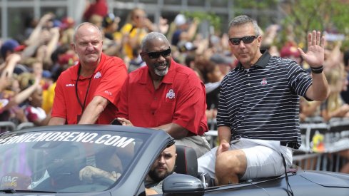 Thad Matta, Gene Smith and Urban Meyer at the Cavs' championship parade. 