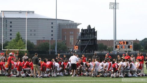 Urban Meyer addresses his team on the first day of fall camp. 