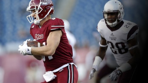 Sep 24, 2016; Foxborough, MA, USA; Massachusetts Minutemen tight end Adam Breneman (81) is pursued by Mississippi State Bulldogs line backer DeAndre Ward (28) during the third quarter at Gillette Stadium. Mississippi State won 47-35. Credit: Greg M. Cooper-USA TODAY Sports