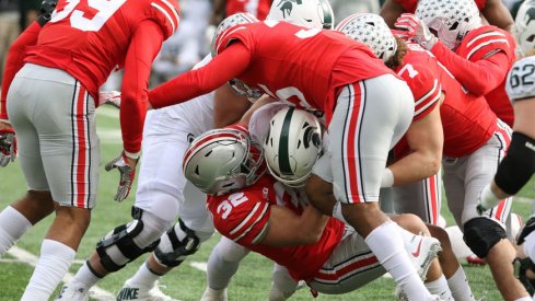 Tuf Borland makes a tackle for Ohio State