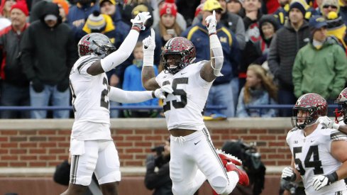 Parris Campbell and Mike Weber celebrate Weber's game-clinching touchdown in Ann Arbor.
