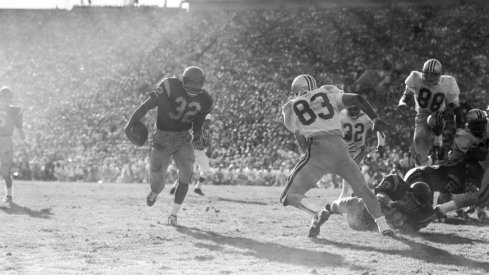 O.J. Simpson runs against Ohio State's defense. (Tournament of Roses)