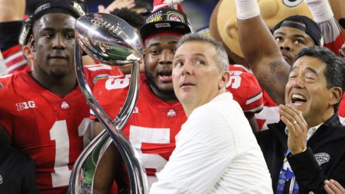 Urban Meyer and the Cotton Bowl Trophy