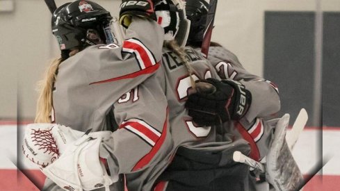 Amanda Zeglen's Buckeye teammates congratulate her on a win over Minnesota State.