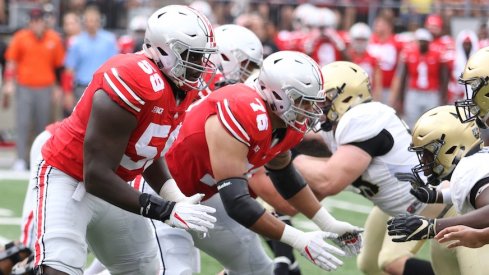 Isaiah Prince (59) and Branden Bowen (76) are among Ohio State's returning starters on its offensive line.