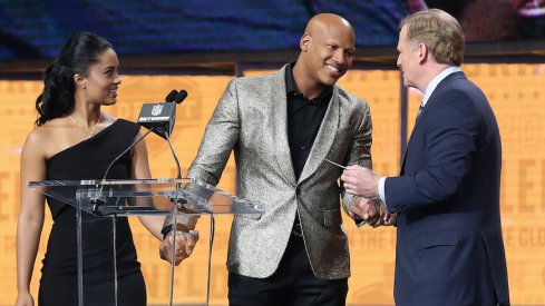 Ryan Shazier, his fiancee Michelle and NFL commissioner Roger Goodell