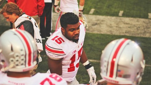 zeke elliott encouraging his offensive line in Bloomington, 2015