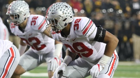 Tuf Borland (32) and Malik Harrison (39)