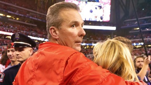 Dec 2, 2017; Indianapolis, IN, USA; Ohio State Buckeyes coach Urban Meyer with his wife Shelley after winning against the Wisconsin Badgers in the Big Ten championship game at Lucas Oil Stadium. Mandatory Credit: Brian Spurlock-USA TODAY Sports