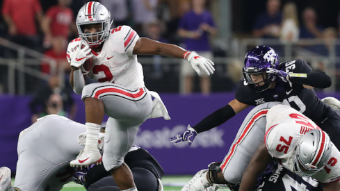 J.K. Dobbins runs against TCU's worn-down defense.