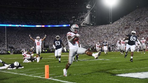 K.J. Hill highsteps into the end zone for the go-ahead touchdown. 