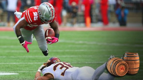 Oct 13, 2018; Columbus, OH, USA; Ohio State Buckeyes running back Mike Weber (25) get the first down over Minnesota Golden Gophers linebacker Blake Cashman (36) during the first quarter at Ohio Stadium. Mandatory Credit: Joe Maiorana-USA TODAY Sports