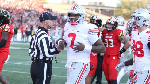 Haskins dusts himself off after another rushing touchdown. 