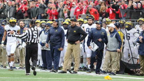Jim Harbaugh watches in anguish as Ohio State drives down the field. 
