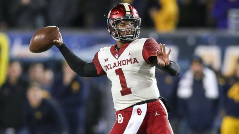 Kyler Murray throws against West Virginia.