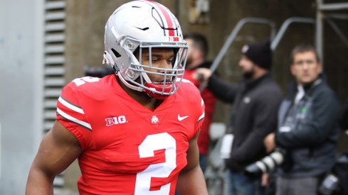 J.K. Dobbins has topped the 1,000-yard mark once again.