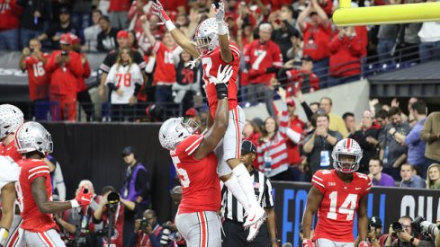 Chris Olave found the end zone again in Indianapolis.