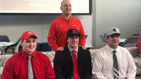 Ryan Jacoby, Noah Potter and Nick Samac joined by Mentor head coach Steve Trivisonno