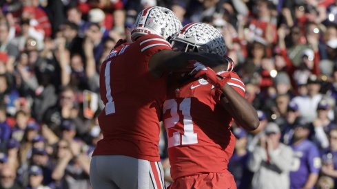 Jan 1, 2019; Pasadena, CA, USA; Ohio State Buckeyes wide receiver Parris Campbell (21) celebrates after making a catch for a touchdown with wide receiver Johnnie Dixon (1) in the first quarter against the Washington Huskies in the 2019 Rose Bowl at Rose Bowl Stadium. Mandatory Credit: Kirby Lee-USA TODAY Sports