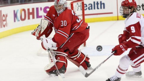 Buckeye goalie Sean Romeo battles the Wisconsin Badgers in a 2-1 overtime victory. 