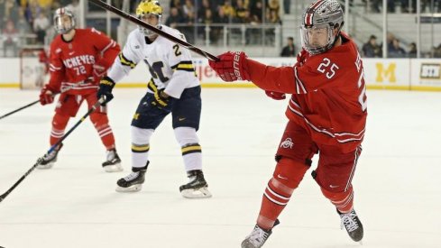 Buckeye senior Brendon Kearney shoots the puck in a 4-2 loss at Michigan. 