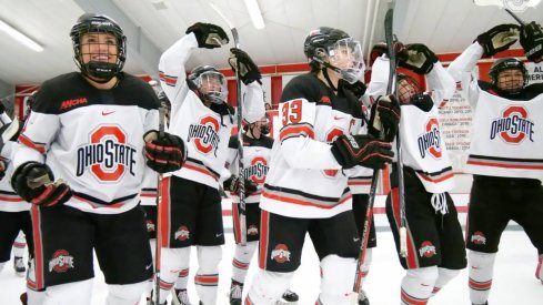 The women's hockey Buckeyes celebrate their WCHA quarterfinal win over Minnesota State.