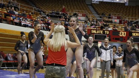 Buckeyes celebrate after a huge performance by Morgan Lowe. 