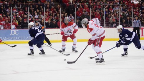 Ohio State's Dakota Joshua connects with a pass in the Big Ten Hockey semifinals against Penn State.