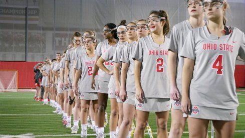 The women's lacrosse team prepares for its upcoming match. 