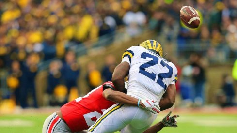 Nov 24, 2018; Columbus, OH, USA; Ohio State Buckeyes cornerback Shaun Wade (24) breaks up a pass intended for Michigan Wolverines running back Karan Higdon (22) during the third quarter at Ohio Stadium. Mandatory Credit: Joe Maiorana-USA TODAY Sports