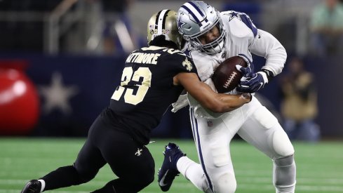 Marshon Lattimore tackling Ezekiel Elliott