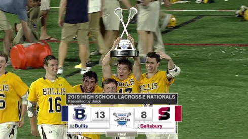 Bryson Shaw holding up the trophy.