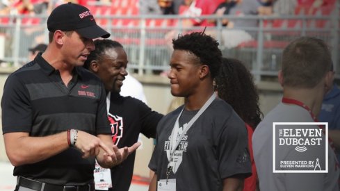 Coach Brian Hartline with a recruit