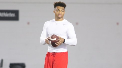 Justin Fields worked at the Woody Hayes Athletic Center with many of Ohio State's wide receivers on Thursday.