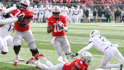 Barrett runs one in for a touchdown against Michigan State. 