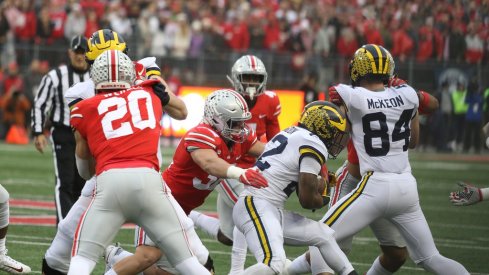 Borland takes down a Michigan ballcarrier. 