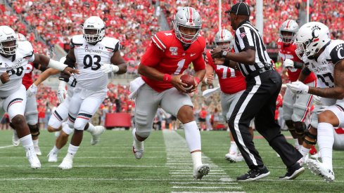 Justin Fields runs for a touchdown.