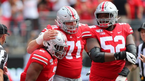 J.K. Dobbins, Josh Myers and Wyatt Davis