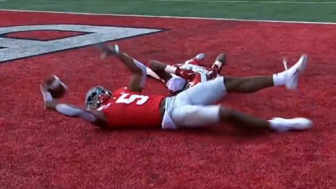 Ohio State wideout Garrett Wilson makes a touchdown catch against the Miami Redhawks