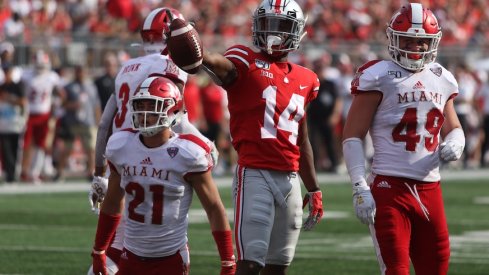 K.J. Hill celebrates after a catch.