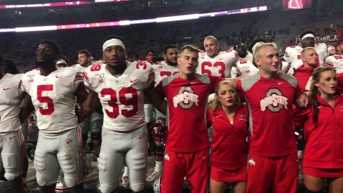 The Buckeyes sing the campus hymn.