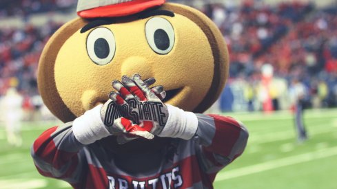 Brutus shows off the Ohio State hands.