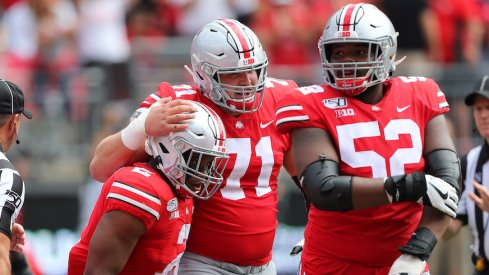 J.K. Dobbins, Josh Myers and Wyatt Davis