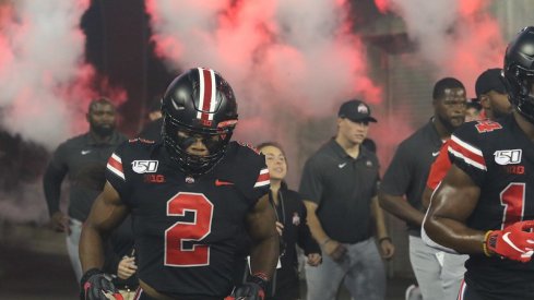 J.K. Dobbins takes the field.