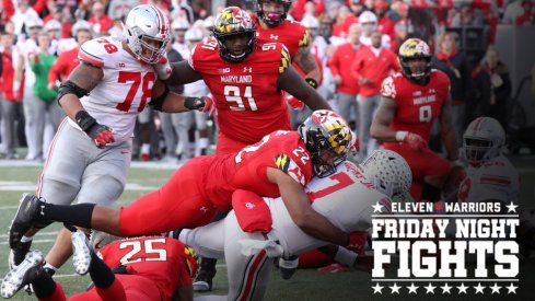 Nov 17, 2018; College Park, MD, USA; Ohio State Buckeyes quarterback Dwayne Haskins (7) dives for the game winning touchdown in overtime against the Maryland Terrapins at Capital One Field at Maryland Stadium. Mandatory Credit: Mitch Stringer-USA TODAY Sports