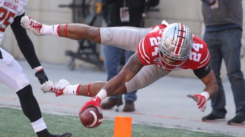 Ohio State's Marcus Crowley reaches for a touchdown against Maryland