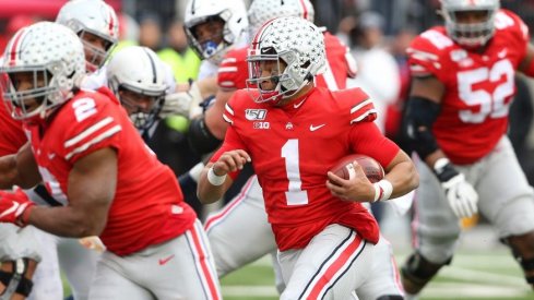 Justin Fields logged a career-high 21 rushing attempts versus Penn State. 