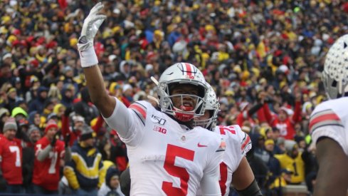 Garrett Wilson celebrates during Ohio State's 56-27 win over Michigan.