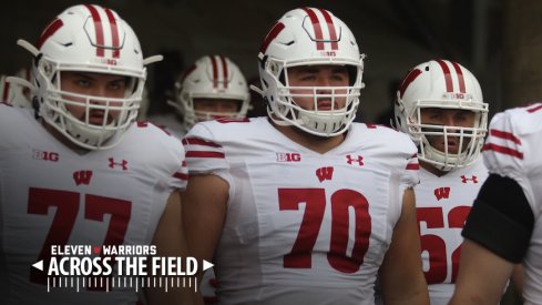 Wisconsin players prepare to take the field before their game at Ohio State.