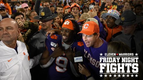 Nov 2, 2019; Clemson, SC, USA; Clemson Tigers head coach Dabo Swinney and running back Travis Etienne (9) talk with an ACC network reporter after defeating the Wofford Terriers at Clemson Memorial Stadium. Mandatory Credit: Adam Hagy-USA TODAY Sports